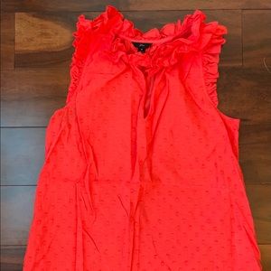 Tank top with ruffle detail around neck